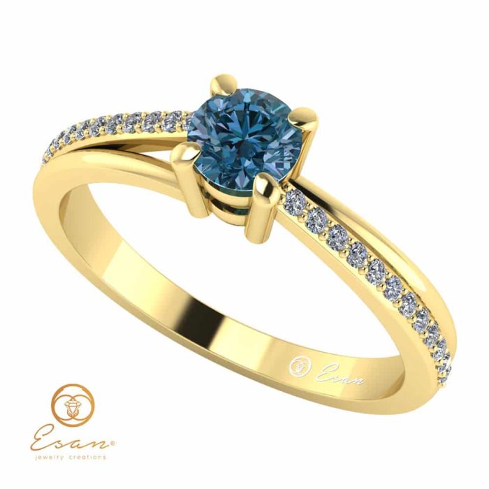 Inel de logodna din aur cu diamant albastru si diamante incolore ES94