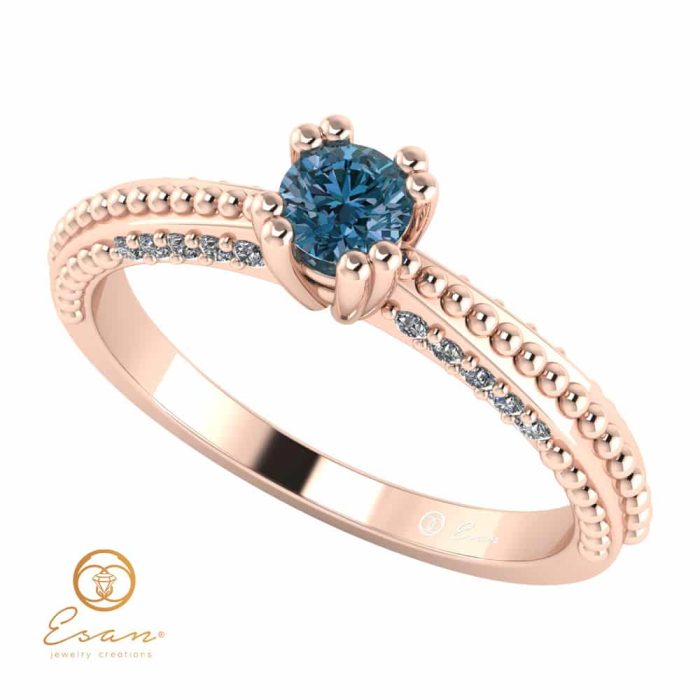 Inel de logodna din aur cu diamant albastru si diamante incolore ES98