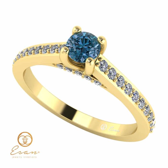 Inel de logodna din aur cu diamant albastru si diamante incolore ES112