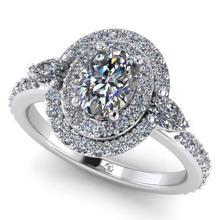 Inel anturaj cu diamant oval si diamante sec ES338