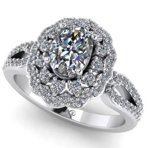 Inel anturaj cu diamant oval si diamante incolore ES335