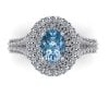 Inel cu diamant albastru oval si diamante din aur alb titlu 750 ES281